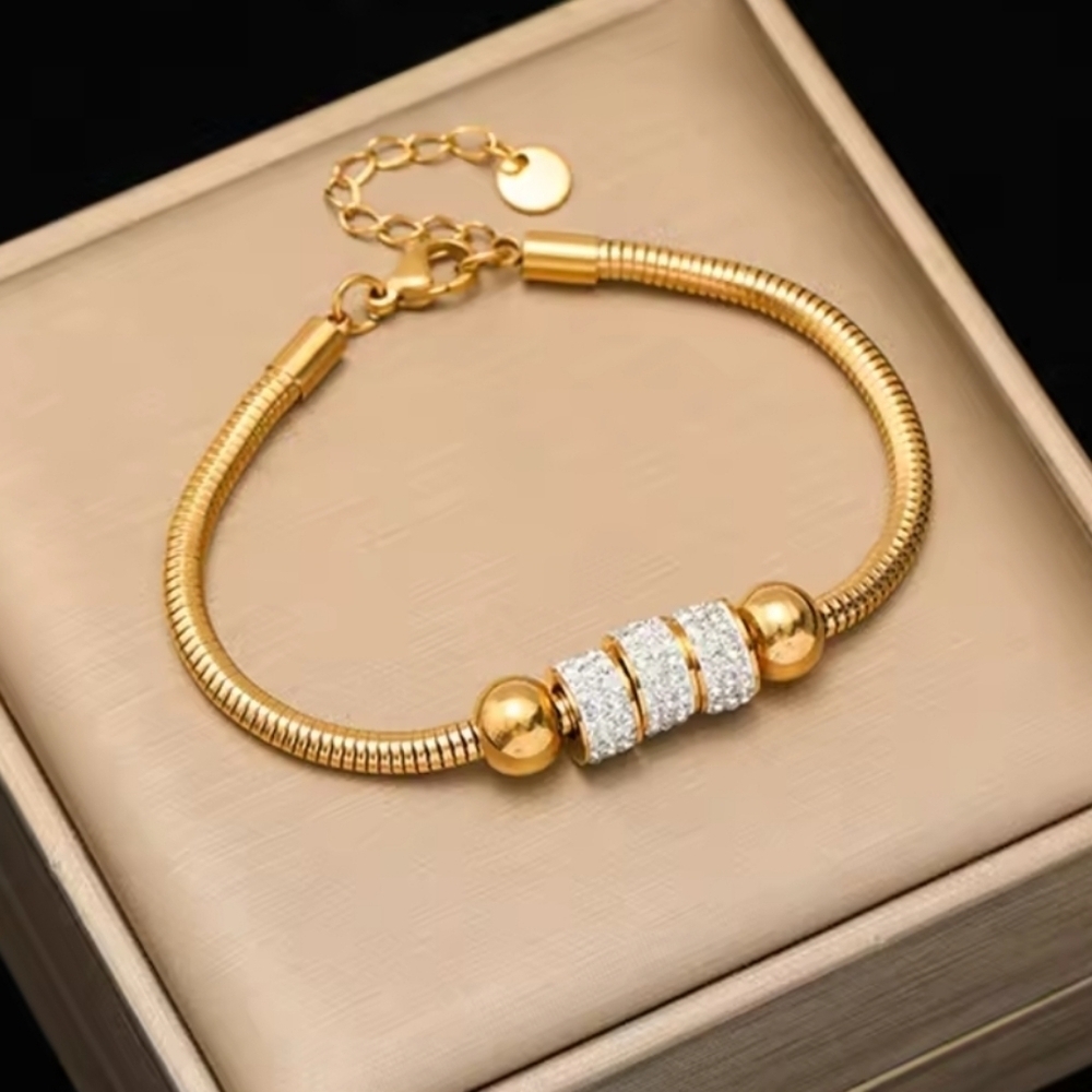 Elegant Gold Bracelet with Silver Accents